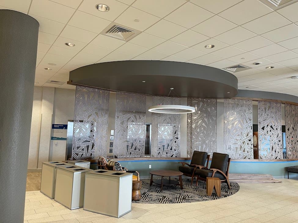 Commercial lobby with painted walls and architectural ceiling